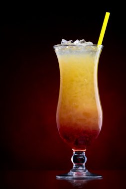 Tequila sunrise Cocktail isolated on a Red clipart