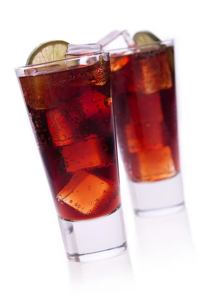 Cocktail with lime and cola on white background — Stock Photo, Image