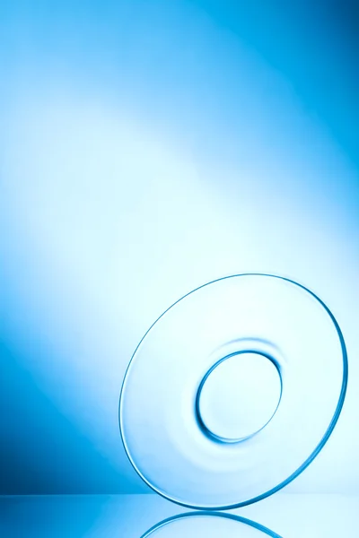 Stock image Brilliant glass with a blue background