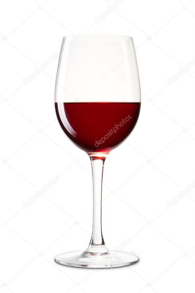 Wine glass on a white with red wine