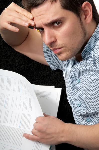 Student man with his book in camera — Stock Photo, Image