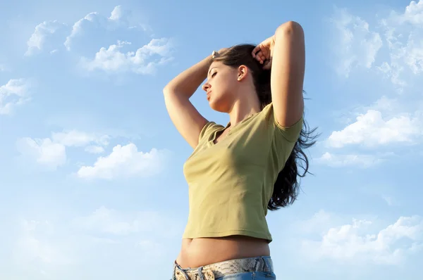 Woman in clouds sky — Stock Photo, Image