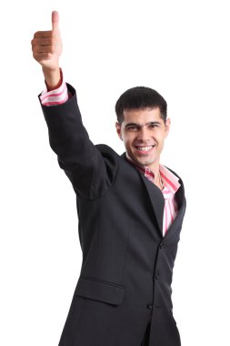 Happy young man in a business suit showing thumb up clipart