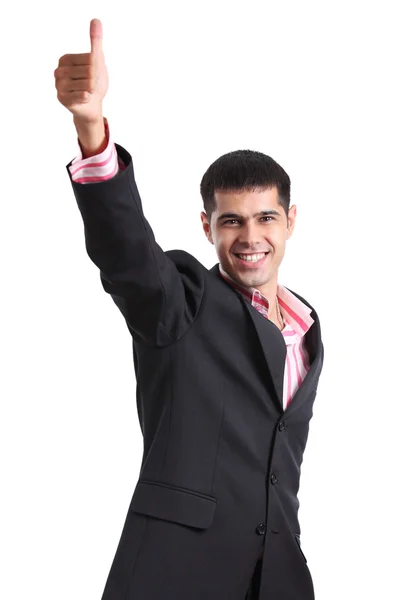Šťastný mladý muž v obleku, ukazuje palec — Stock fotografie