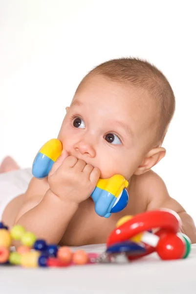 Schönes Baby mit Spielzeug — Stockfoto