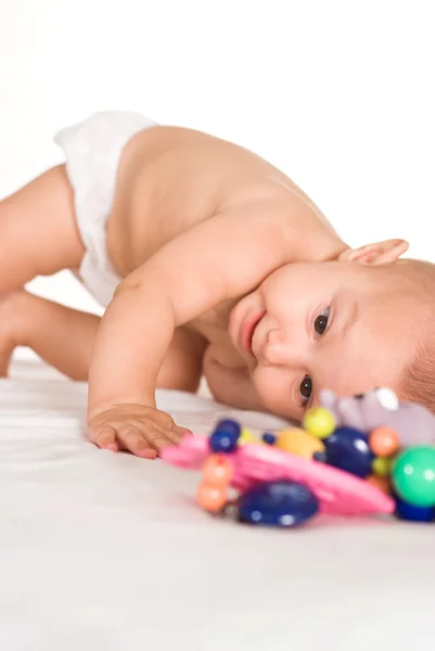 Leuke baby met speelgoed — Stockfoto