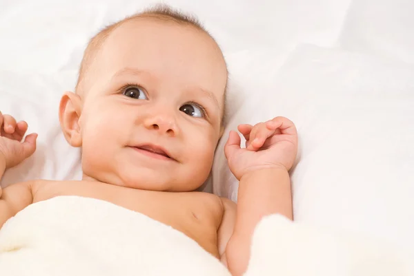 Child in a bed — Stock Photo, Image