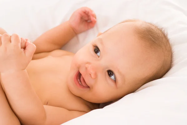 Child in a bed — Stock Photo, Image