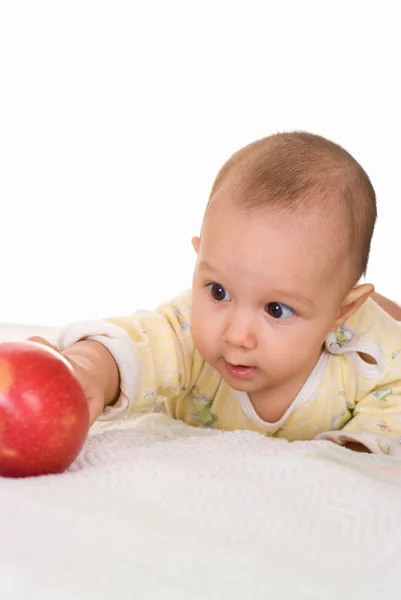 Baby und ein Apfel — Stockfoto