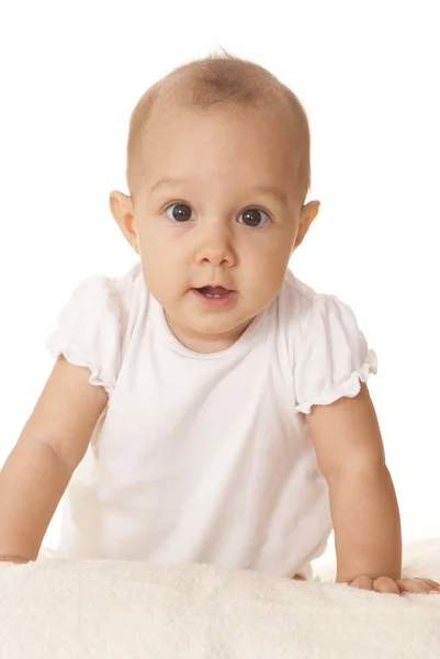 Klein meisje in een witte kleren — Stockfoto