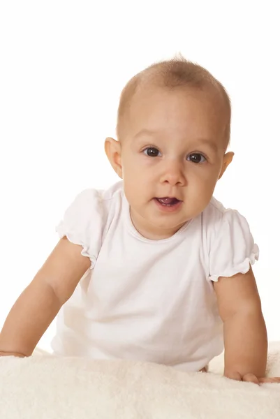 Klein meisje in een witte kleren — Stockfoto