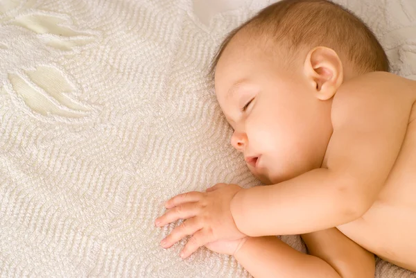Nice baby sleep on a white — Stock Photo, Image