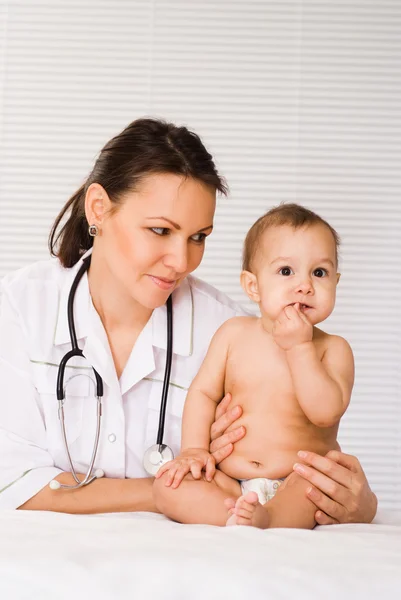 Beautiful doctor and baby — Stock Photo, Image