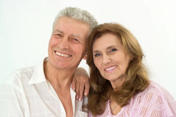 Šťastný starší pár na bílé — Stock fotografie
