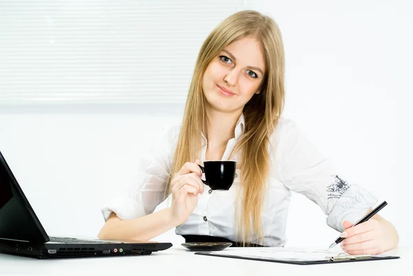 Cute businesswoman with a black cup — Stock Photo, Image