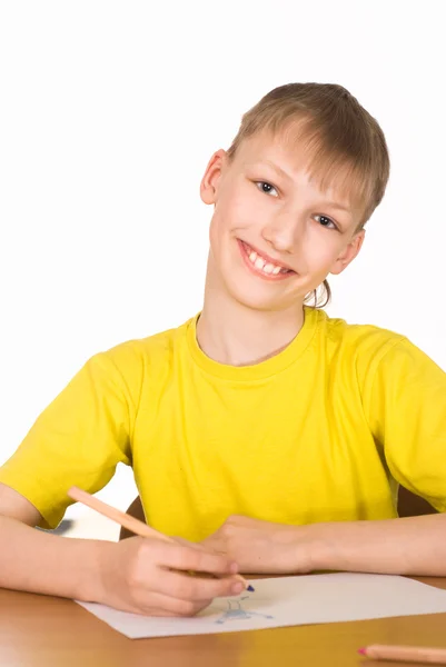 Young boy at the table — Stock Photo, Image