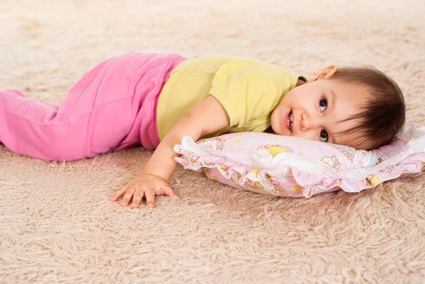 Little kid on the carpet — Stock Photo, Image