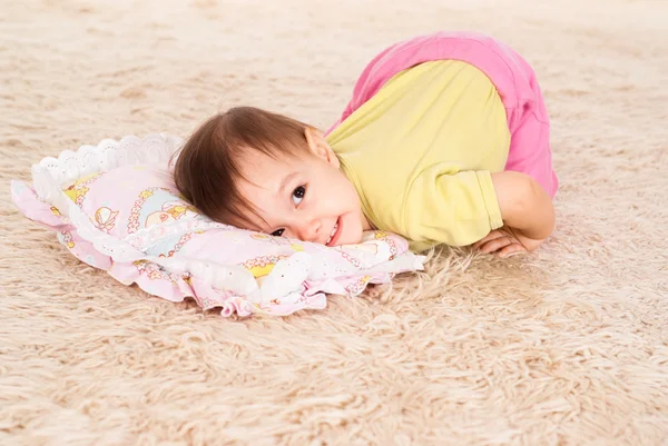 Little kid on the carpet — Stock Photo, Image