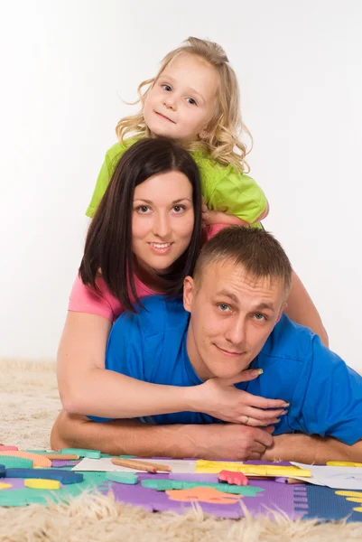 Família no tapete — Fotografia de Stock