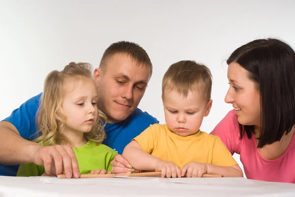 Family on the table — Stock Photo, Image
