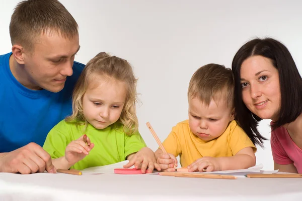 Family on the table — Stock Photo, Image