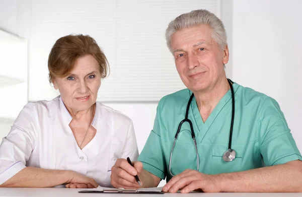 Two doctors on white — Stock Photo, Image