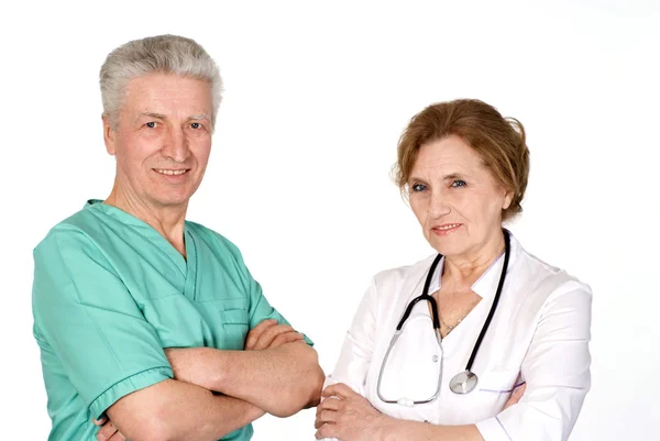Två ledande läkare på vit — Stockfoto