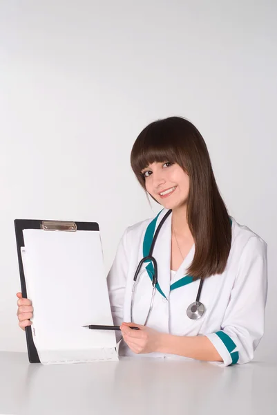 Mooie verpleegster zitten — Stockfoto