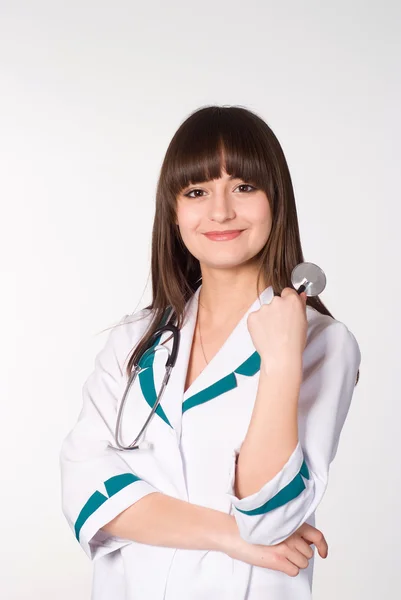 Vacker sjuksköterska ständiga — Stockfoto