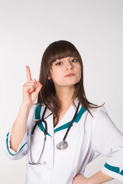 Schöne Krankenschwester stehend — Stockfoto