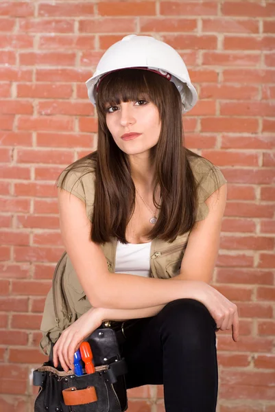 Menina bonita em um capacete — Fotografia de Stock
