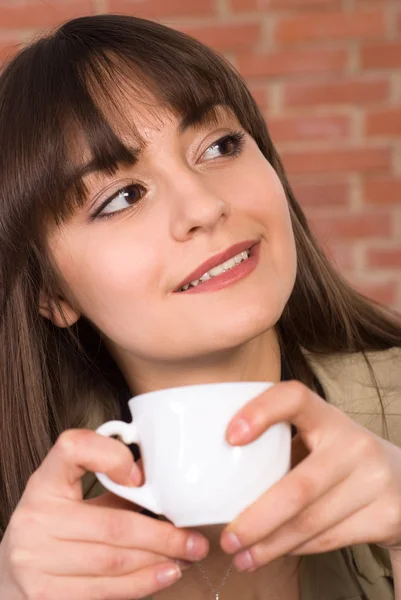 Chica bonita con una taza —  Fotos de Stock