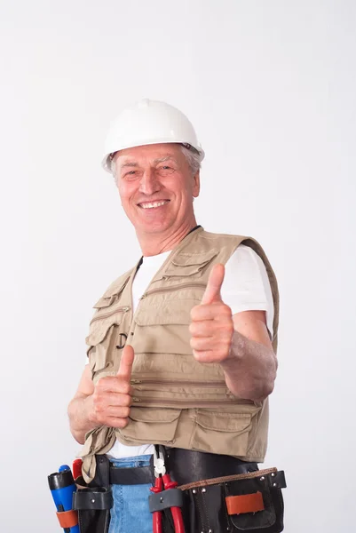 Senior Bauarbeiter mit Helm — Stockfoto
