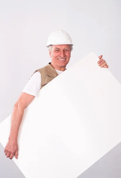 Senior builder in helmet — Stock Photo, Image