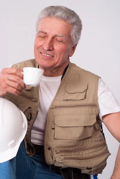 Senior builder rests — Stock Photo, Image