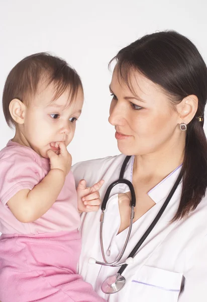 Zdravotní sestra s dítětem — Stock fotografie