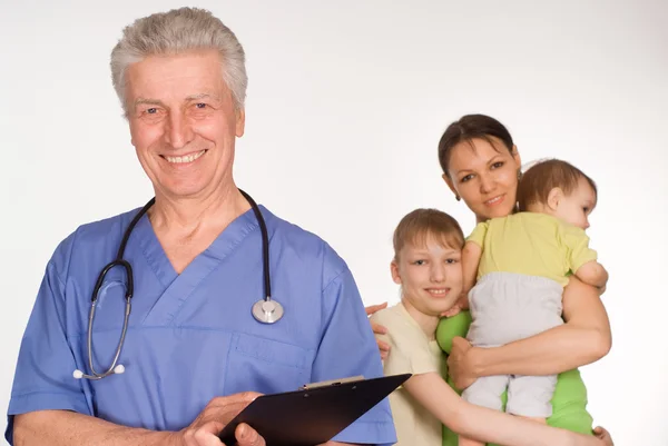 Old doctor and patients — Stock Photo, Image