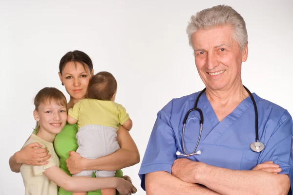 Old doctor and patients — Stock Photo, Image
