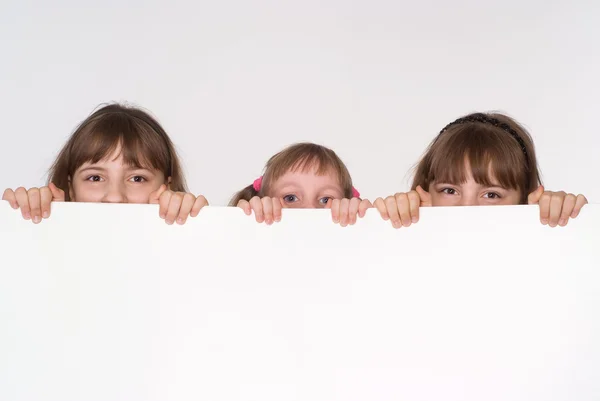 Three hiding girls — Stock Photo, Image