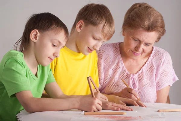 Grandmother and her grandsons — Stock Photo, Image