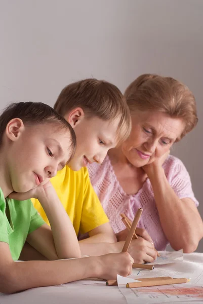 Grandmother and her grandsons — Stock Photo, Image