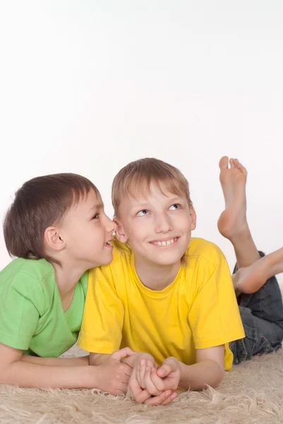 Two brothers whispering — Stock Photo, Image
