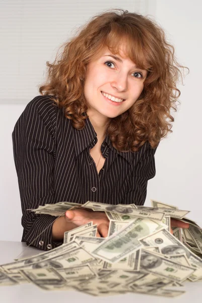 Menina segurando dinheiro — Fotografia de Stock