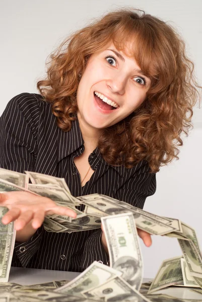 Chica sosteniendo dinero —  Fotos de Stock