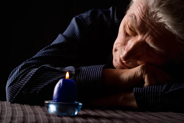 Man and candle — Stock Photo, Image