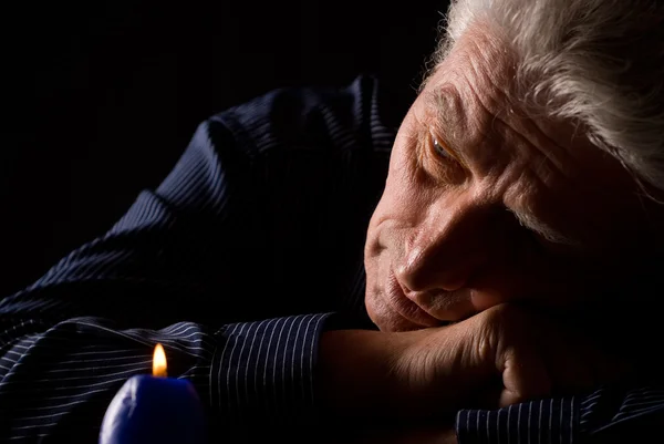Man and candle — Stock Photo, Image