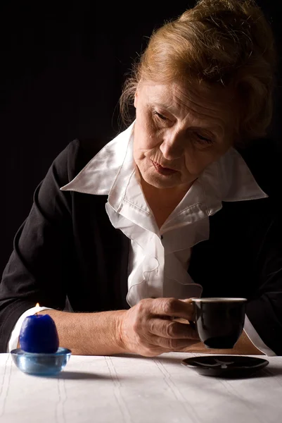 Woman and candle — Stock Photo, Image