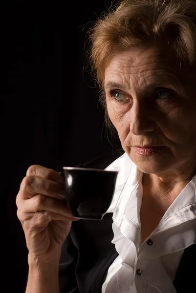 Elderly woman drink — Stock Photo, Image