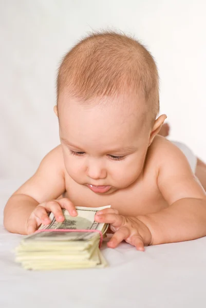 Child and money Stock Image