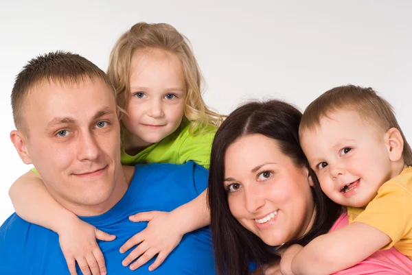 Portrait of happy family of four Stock Picture